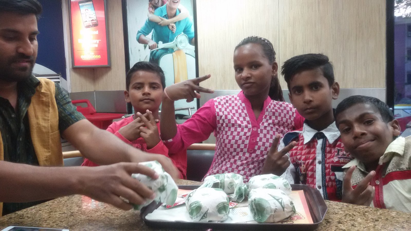 Children sharing a meal during an educational tour outing