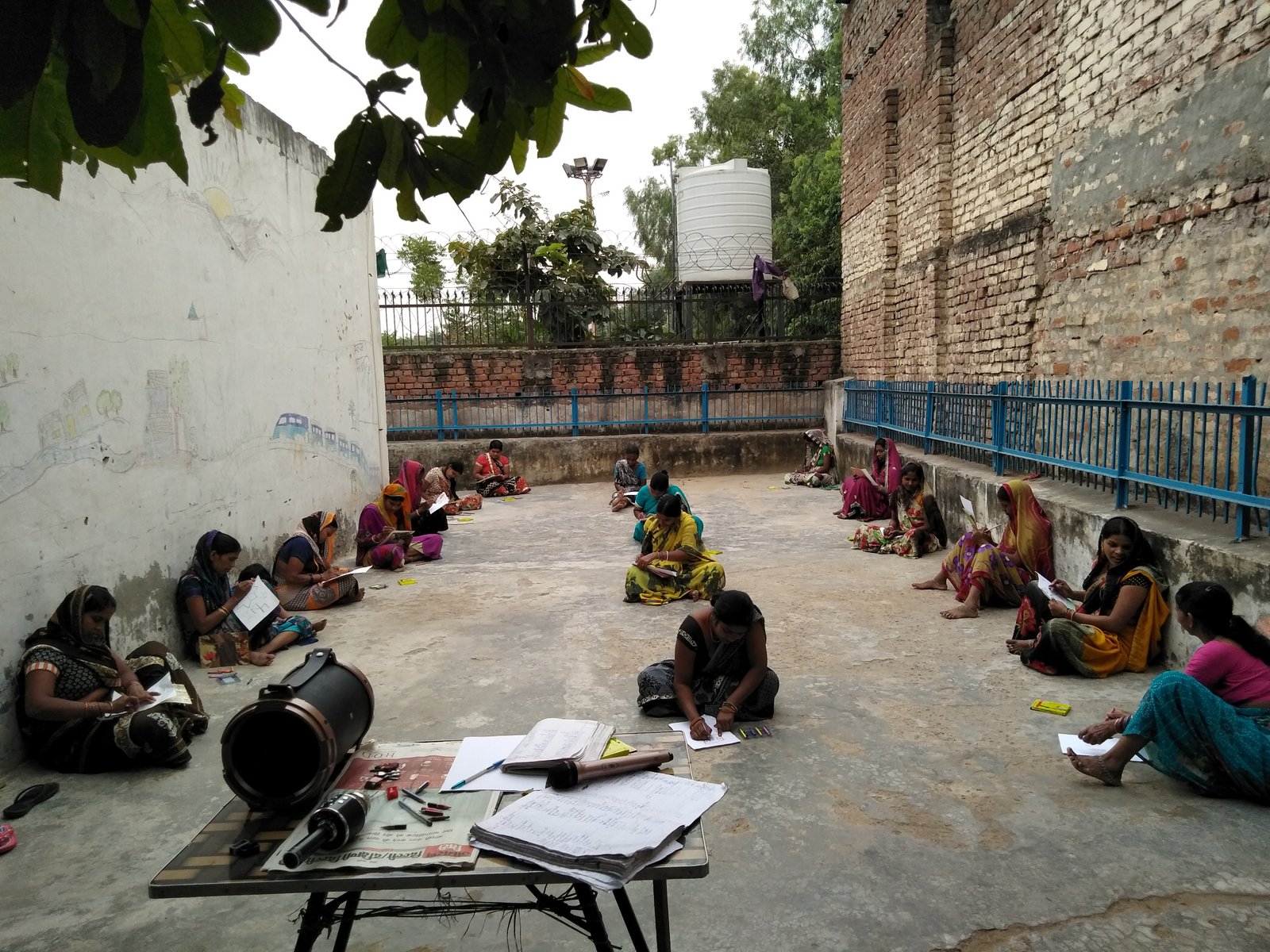 Women participating in a grassroots awareness and literacy workshop